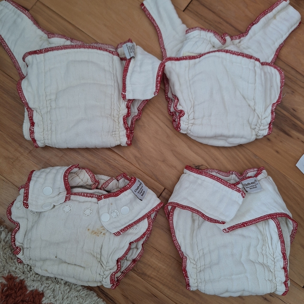 Four Used Cloth Eez Workhorsesl Fitted Diapers.
